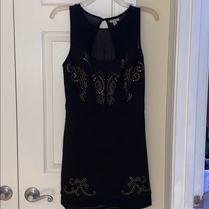 Black with gold emblem dress